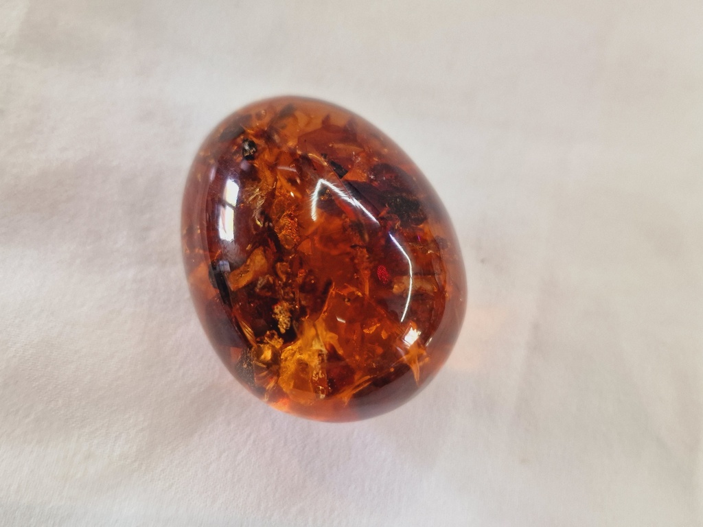 russian pressed amber egg on stand 73 .3 g